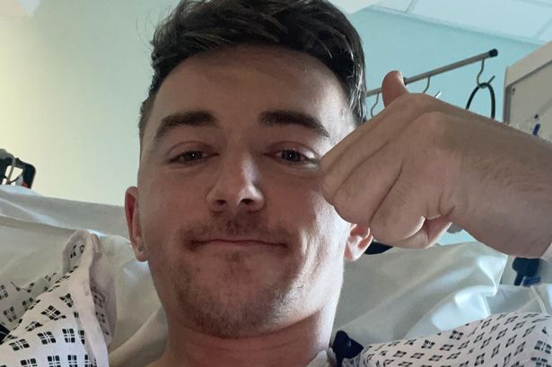 Footballer has spleen removed after horror collision during league match