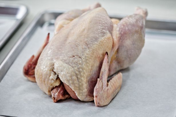 People are divided over whether you should wash a raw chicken before cooking it