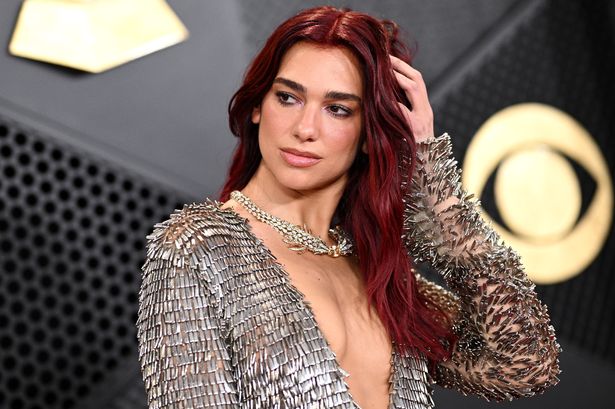 Dua Lipa’s dewy ‘milk jelly’ mani was the ‘it girl nails’ of the Grammys