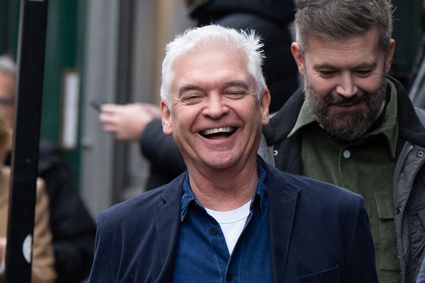 Phillip Schofield in high spirits as he laughs and smiles with friends amid This Morning news