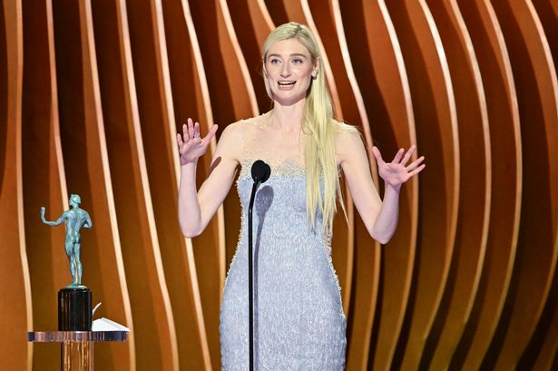 Netflix’s The Crown’s Elizabeth Debicki accepts SAG Award barefoot after ditching heels