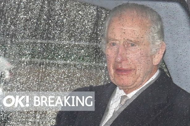 King Charles waves as he returns to London with Camilla amid cancer treatment