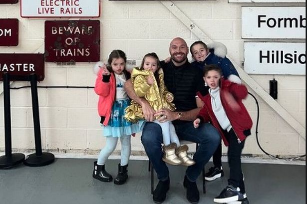 Tyson Fury enjoys steam train ride with Paris and kids at Lancashire museum