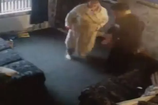 Despicable couple filmed THEMSELVES bagging up spice in front of child on living room floor