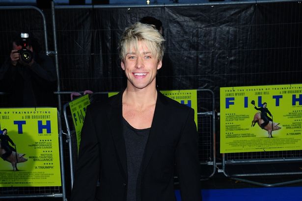 Skins’ Maxxie Oliver actor Mitch Hewer unrecognisable with baby daughter – 16 years after show exit