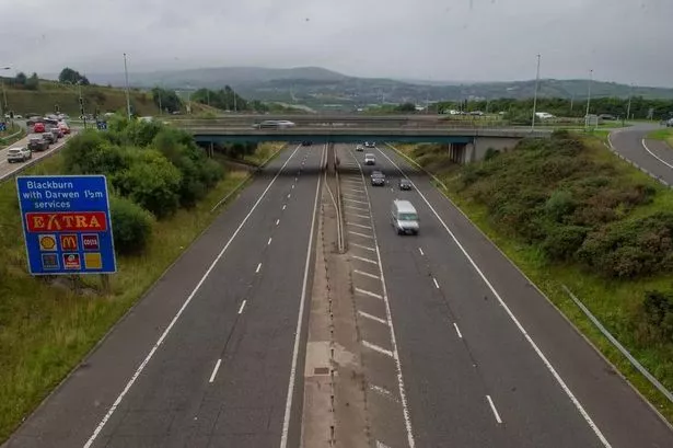 Motorway cops find £9k stashed in boot of Audi stopped on M65