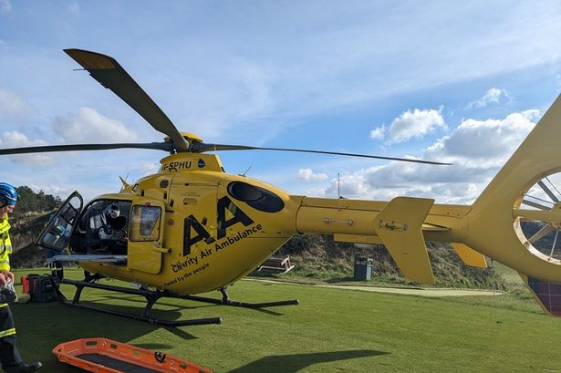 Air ambulance forced to land at golf club after beach incident