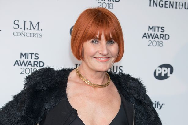 Mary Portas unrecognisable without signature red bob as she showcases transformation to collect OBE