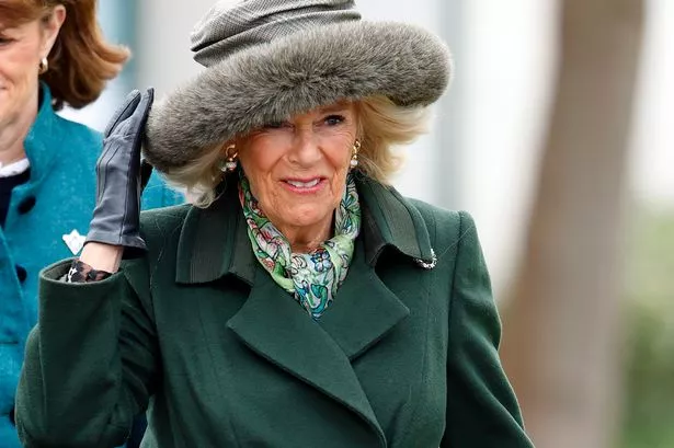 Camilla’s green belted coat was the perfect pick for Cheltenham Festival – and we’ve found a £130 alternative