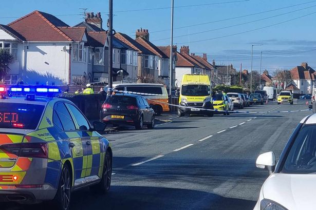 Woman in her 80s taken to hospital after being hit by van