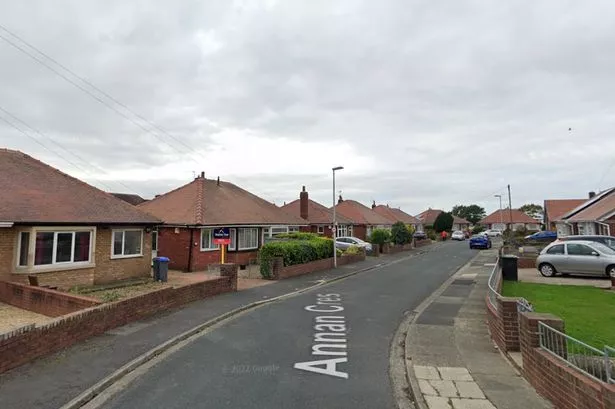 Man injured as he tried to stop masked intruders who attacked a woman in her home