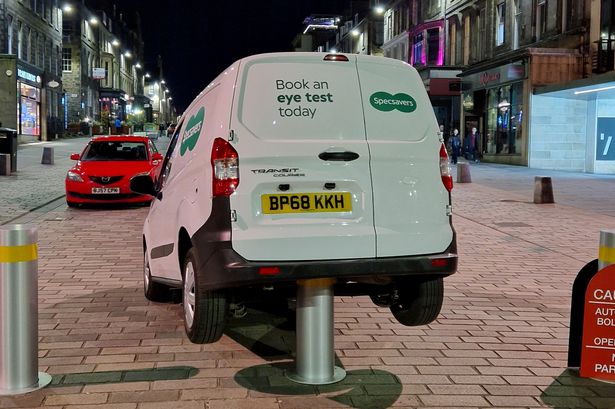 ‘Should have gone to Specsavers’ as optician’s van gets wedged on bollard