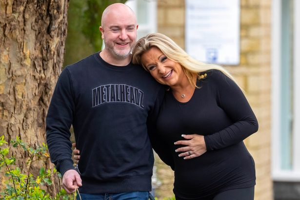 Daisy May Cooper confirms pregnancy as she cradles baby bump and kisses boyfriend Anthony Huggins