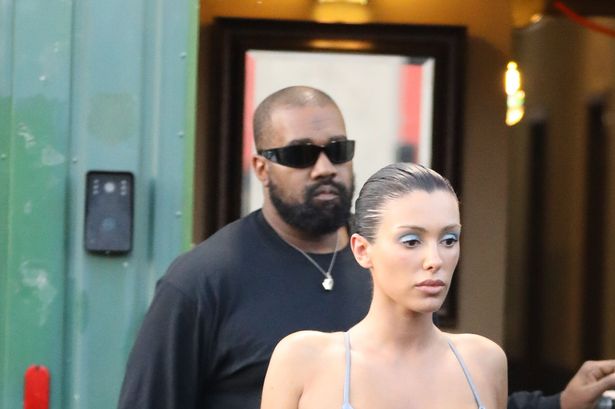 Kanye West’s wife Bianca Censori channels Kim Kardashian as she models silver bikini