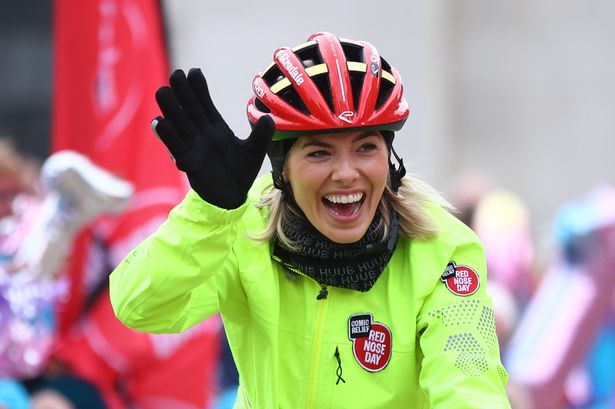 Mollie King sobs as she finishes epic Comic Relief bike ride in memory of tragic dad