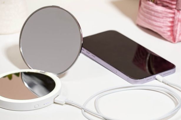 This £30 handheld LED makeup bag mirror doubles as a phone charger on the go