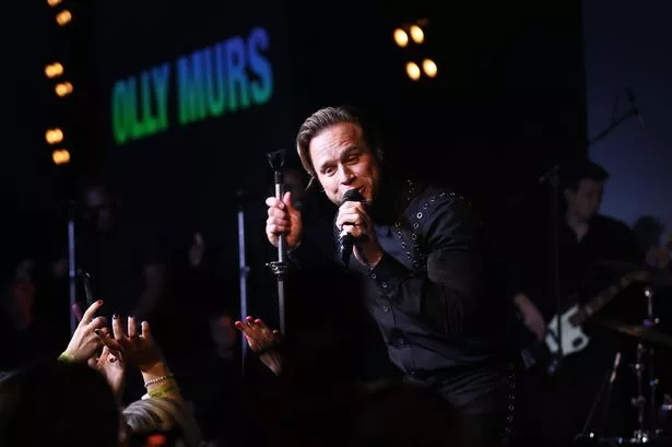 Olly Murs makes heartbreaking confession about fatherhood live on stage at Take That tour