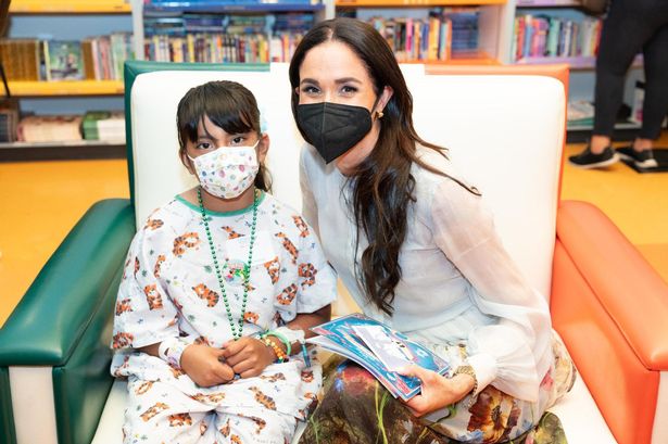 Meghan Markle shows off acting skills as she reads to children during visit to LA hospital