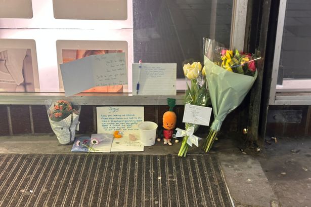 Floral tributes left at scene as woman who died after being found on bench named locally