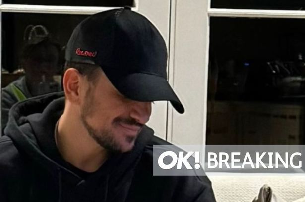 Peter Andre reveals new baby pic as he cradles newborn daughter