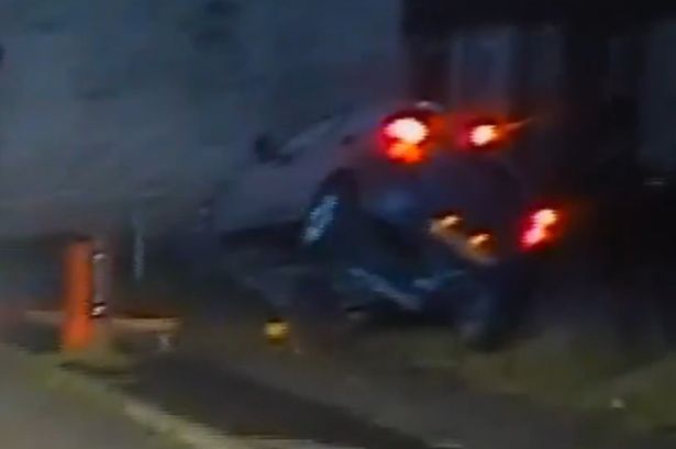 Dramatic moment police chase ends with car crashing into bollard