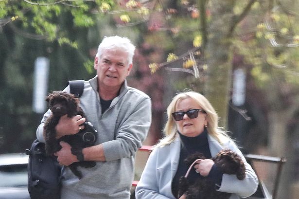 Phillip Schofield supported by loyal wife on birthday stroll after divorce vow