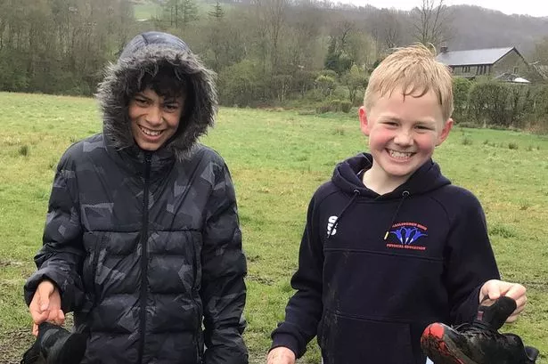 Schoolboys refuse to let something like no shoes get in the way of orienteering victory