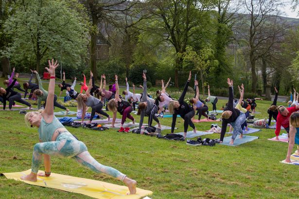 Crowds flock to Rawtenstall park for first ever open-air yoga class