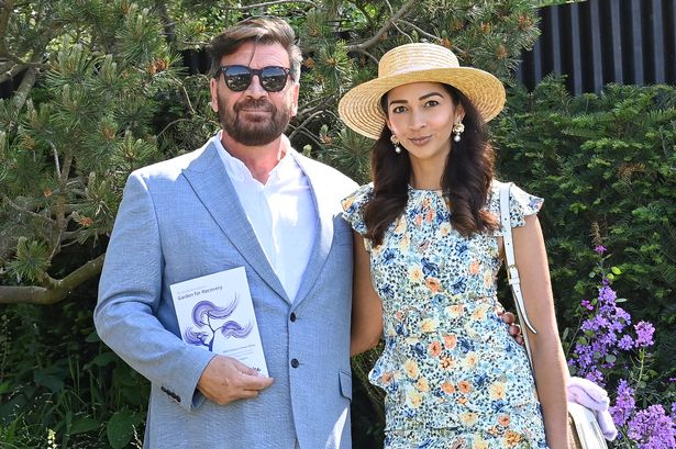 Nick Knowles, 61, kisses stunning fiancee Katie Dadzie, 34, at Chelsea Flower Show