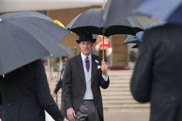 Prince William and cousins Zara, Beatrice and Eugenie brave the rain to represent Charles at garden party