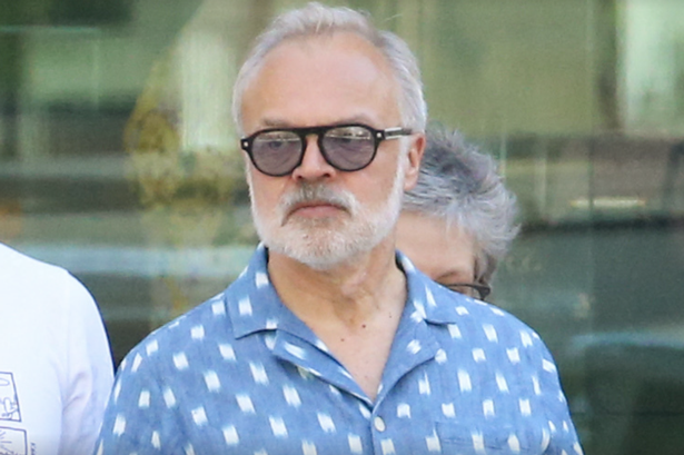 Graham Norton pictured with rarely-seen husband on stroll in New York on post-Eurovision break