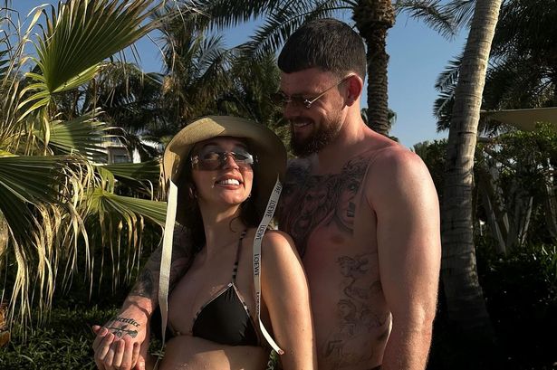 Megan McKenna hints at baby’s gender with clue as she shows off blossoming bump in Dubai