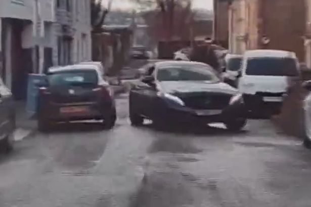 Terrifying footage shows banned driver lead police on chase down narrow streets