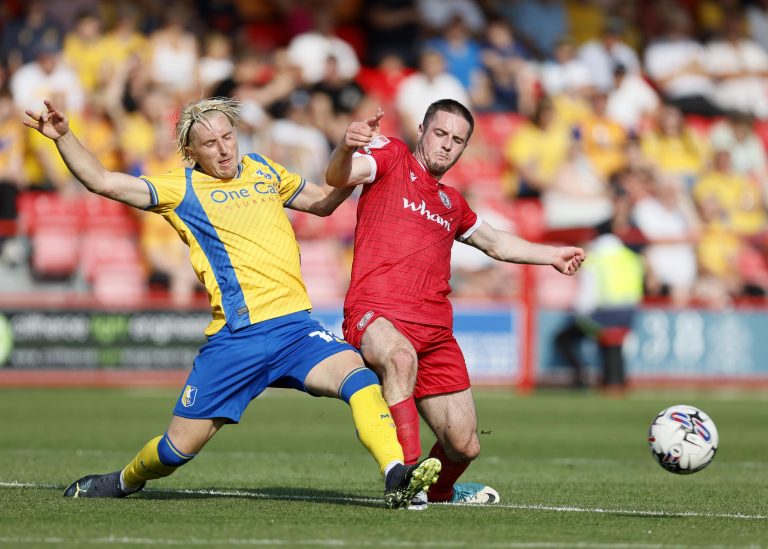 Accrington Stanley midfielder Liam Coyle signs new deal