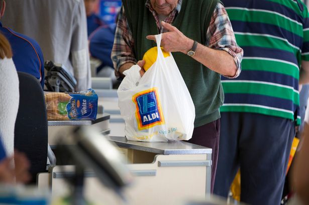 There’s a serious reason Aldi checkout staff scan your shopping so fast