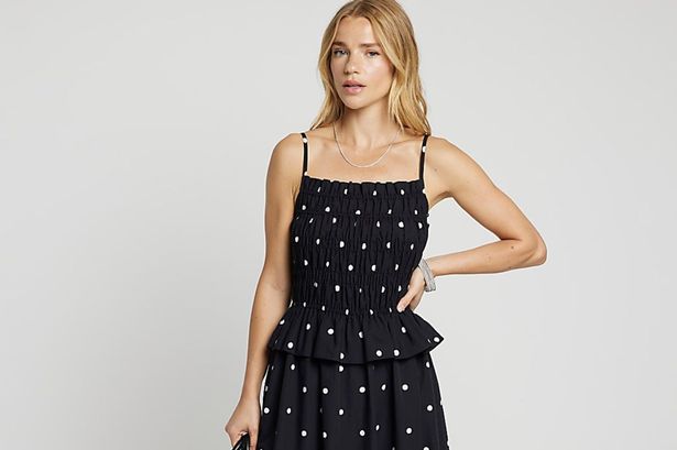 River Island’s flattering cinched waist midi dress is a high street hero, says OK! fashion editor