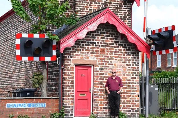 A tiny cottage on the tracks is one of the last of its kind on the railway line