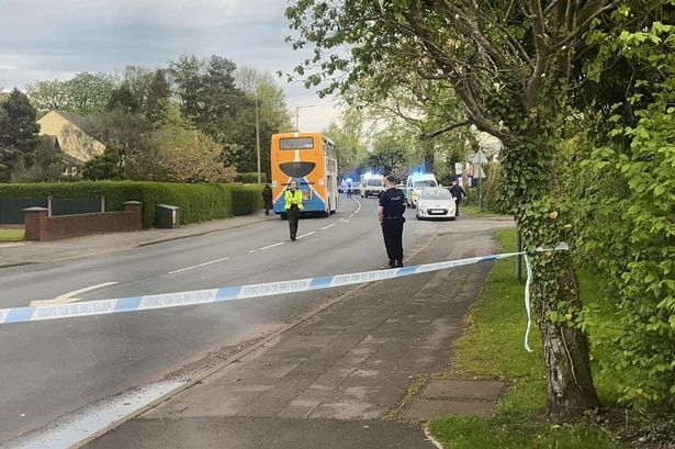 Driver dies in horror crash after car collides with bus shelter and church wall