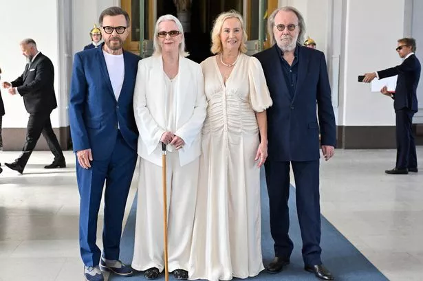 ABBA reunite to collect prestigious knighthood from Swedish King and Queen in incredible pics