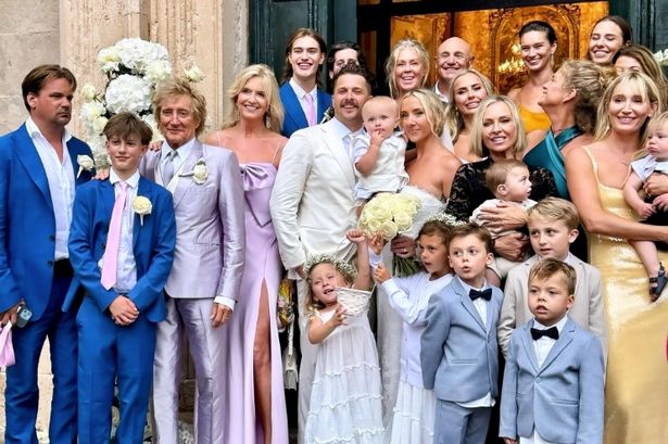 Rod Stewart, 79, poses with his eight kids as he attends son’s wedding with wife Penny Lancaster