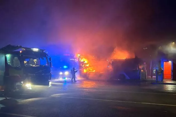 Burnley bus fire: Dramatic moment raging inferno tears through double decker at station