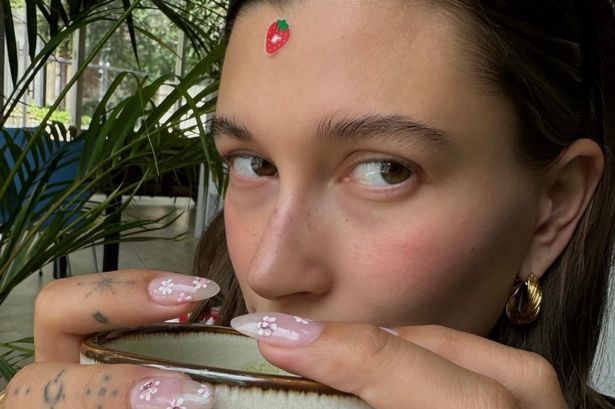 Create Hailey Bieber’s cherry blossom nail art at home with this easy tutorial