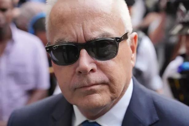 Huw Edwards seen for first time in months as ex-BBC star arrives at court in sunglasses to face child sex abuse material charges