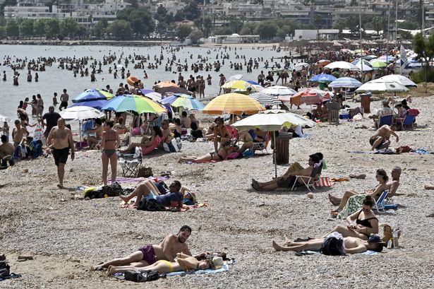 Greece travel warning over Covid cases as mask and testing rules reintroduced