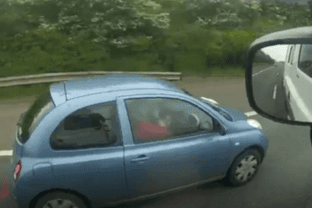 Bonkers M6 drivers caught applying make-up, using laptops and eating takeaways