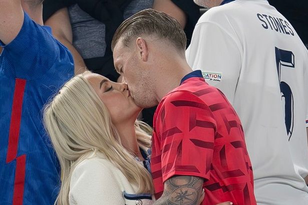 England WAGs pack on the PDA with football star partners after cheering team on to secure spot in Euros final