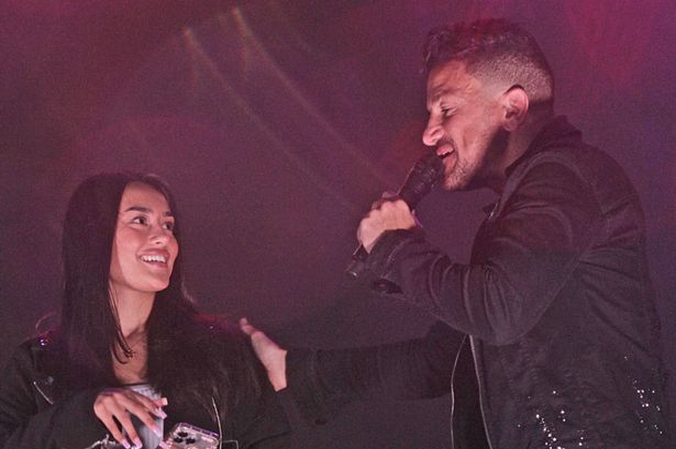 Peter Andre brings son Junior’s girlfriend on stage at festival to celebrate her birthday