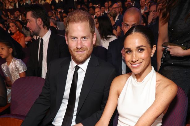 Meghan Markle stuns in replica of her wedding reception dress at ESPY Awards with Prince Harry