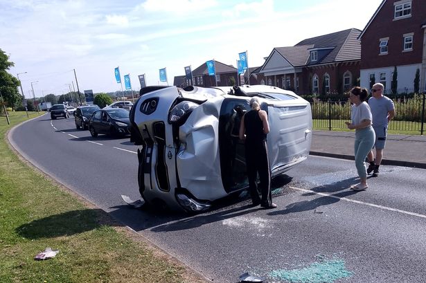 Live updates as Lytham St Annes Queensway closed in both directions after car flips on its side