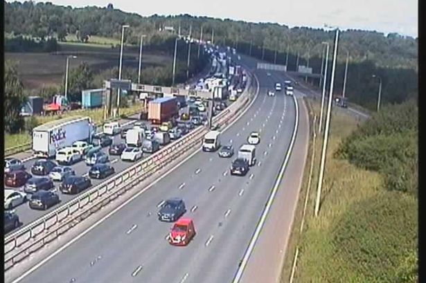 LIVE M6 traffic held causing queues as obstruction blocks road